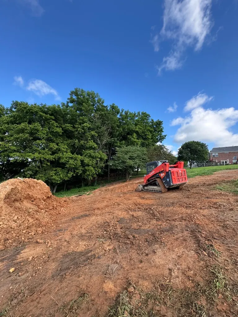 Structural excavation with an excavator digging footings or trenches and staging spoils in Baldwin County — Excavation Elite